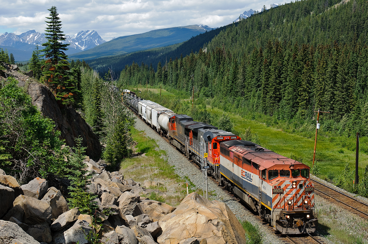 With 199 cars (11,775') in tow, BCOL C40-8M 4604, CN C40-8 2006 and CN C44-9W 2547 coast towards Jasper leading train A416.