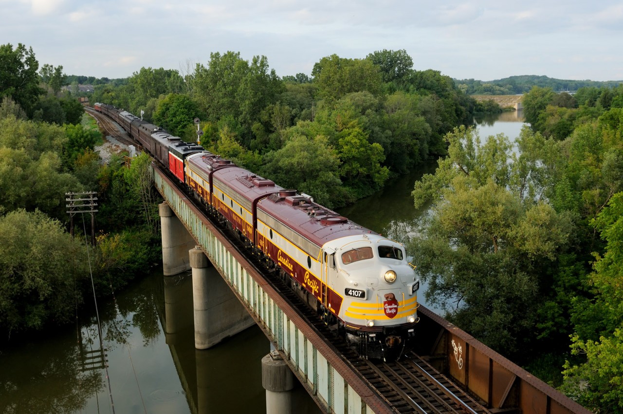 After a meet with CP train 254, which took Coakley Siding, CP 4107 leads business train 40B-17 across the Thames River as it approaches Woodstock yard.