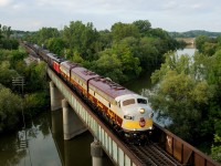 After a meet with CP train 254, which took Coakley Siding, CP 4107 leads business train 40B-17 across the Thames River as it approaches Woodstock yard.