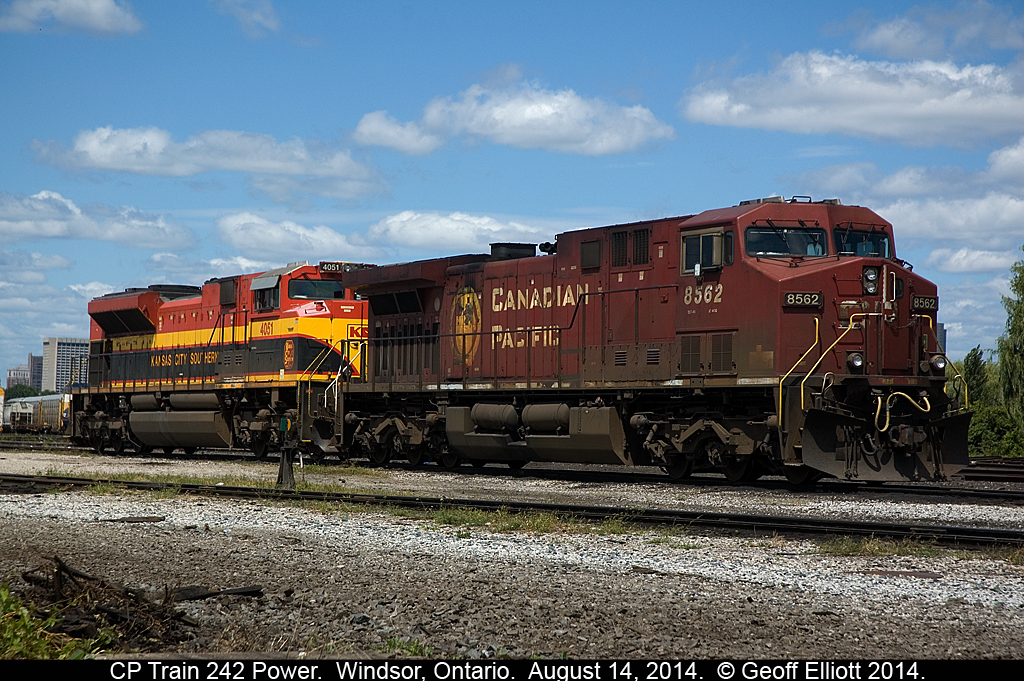 After CP 242 came over the border into Windsor, they shoved the train into Windsor Yard and tied down the power.  Fortunately they left it out where it was reasonably "shootable".  KCS SD70ACe #4051 adds a nice bit of color to the normal CP red that usually occupies the ready track here.