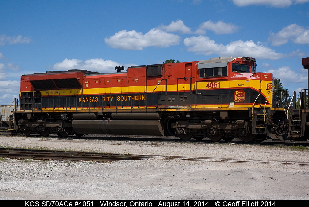 KCS SD70ACe #4051 sits on the ready track with CP 8562 in Windsor on August 14, 2014.  Gotta love them "Southern Belles".......