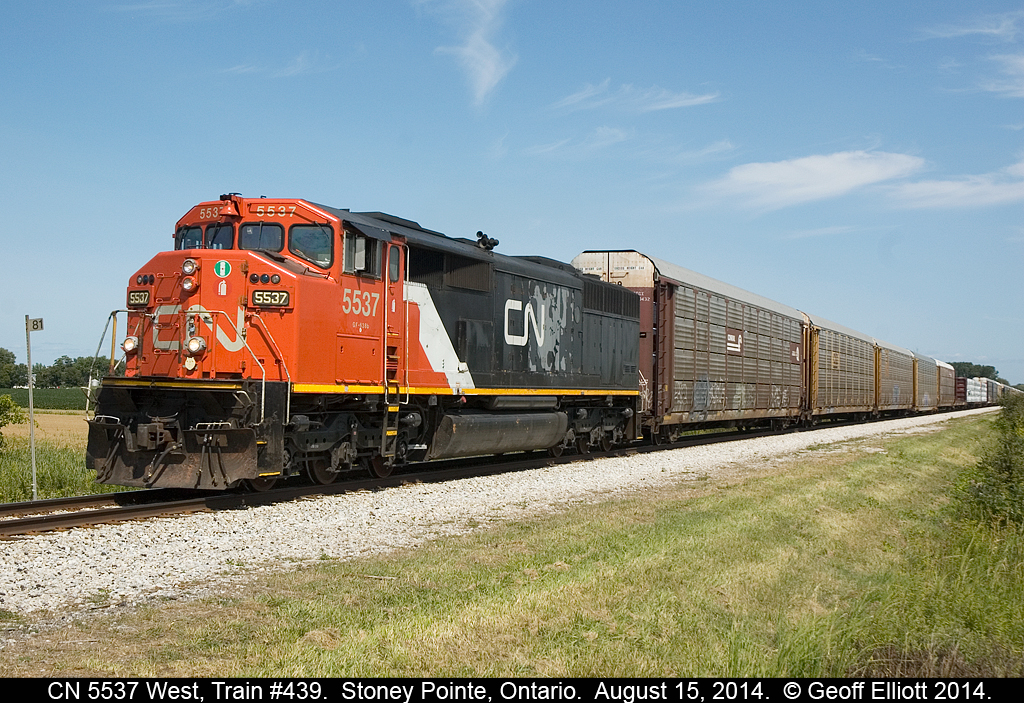 With CP's F units on their way to London for the Canadian Women's LPGA Tournament, CN ponied up their own 'F' unit for me.  Here SD60F #5537 runs solo as it leads a fairly large CN #439 west past MP 81 on the VIA Chatham sub as it approaches Stoney Pointe.