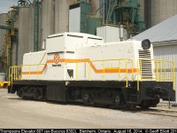 Thompsons Elevators GE 80Tonner, form Bucyrus 8302, seen @ http://www.railpictures.ca/?attachment_id=14906, is now seen in it's new colors as it rests quietly at the grain facility in Blenheim, Ontario.
