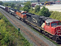 CN 5776 leads BNSF 4824 and BNSF 9815 (my very first BNSF executive scheme) with a train load of crude oil bound for the refineries in Quebec. Thanks dad for beating the traffic so we could catch this train. 