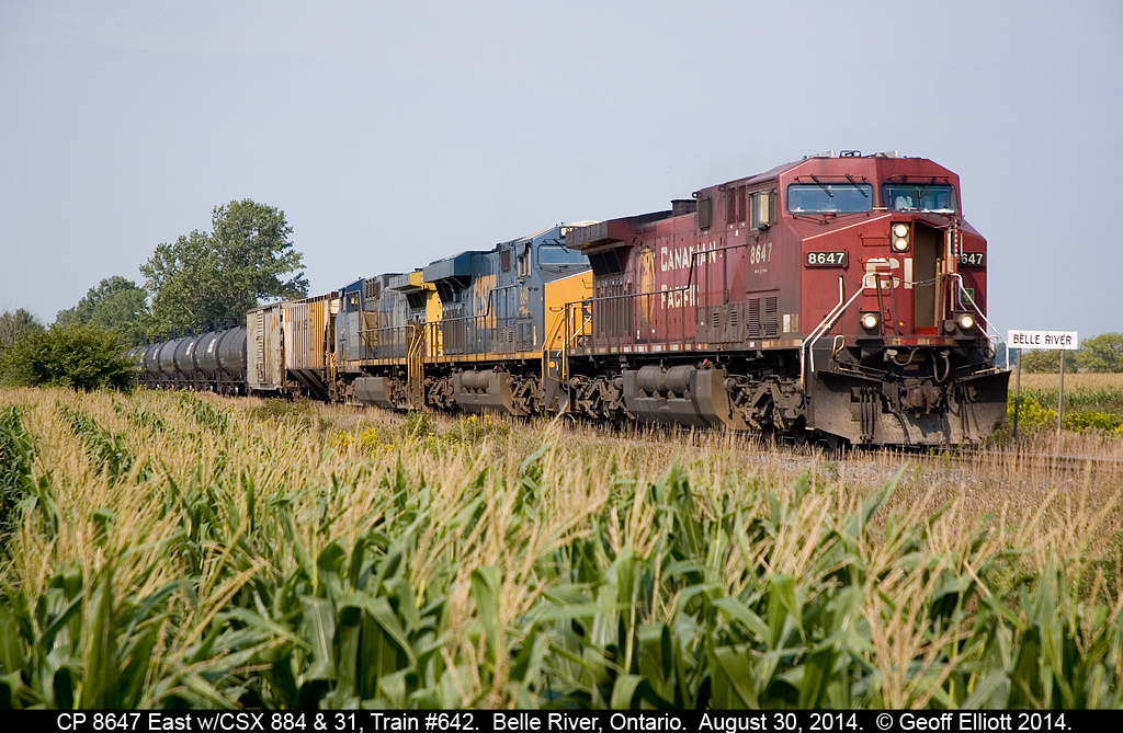 CP 8647 has CSXT 884 and CSXT 31 in tow on train #642 today as it approaches Strong, Road just east of Belle River, Ontario on a muggy August morning.