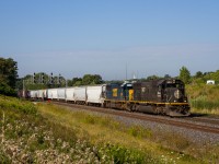 A stellar pair of EMD's charge an 'around the lakes' detour through CN Snake on a sunny morning in August. Thanks to a timely update from James Gardiner in the railfan group, I was able to shoot my first Illinois Central leader in good lighting. This train (CN 349) originated at Kirk Yard in Gary, Indiana and is bound for Symington Yard in Winnepeg - a whole lotta' detouring to avoid the windy city!