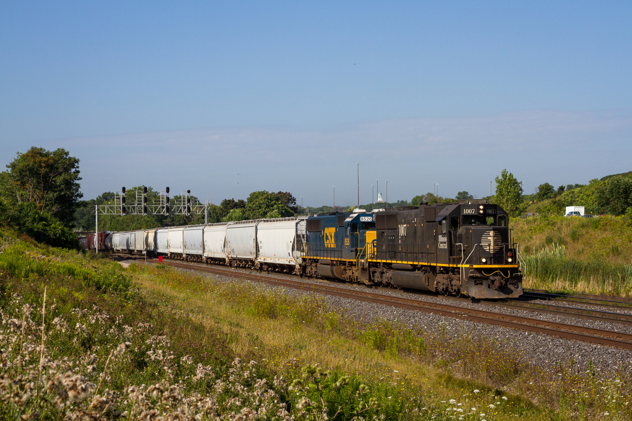 A stellar pair of EMD's charge an 'around the lakes' detour through CN Snake on a sunny morning in August. Thanks to a timely update from James Gardiner in the railfan group, I was able to shoot my first Illinois Central leader in good lighting. This train (CN 349) originated at Kirk Yard in Gary, Indiana and is bound for Symington Yard in Winnepeg - a whole lotta' detouring to avoid the windy city!