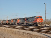 This was quite the surprise at the end of a long successful day spent in the yard catching action. The long westbound 186 car manifest had C-449W 2523 leading followed by SD70I 5616,SD75I 5740,GP38-2 4727,SD50F 5423 and GP40-2W 9423.