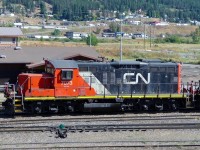 One of the local GP9u's idling in front of the depot after working the yard marshalling loaded centre beams. 