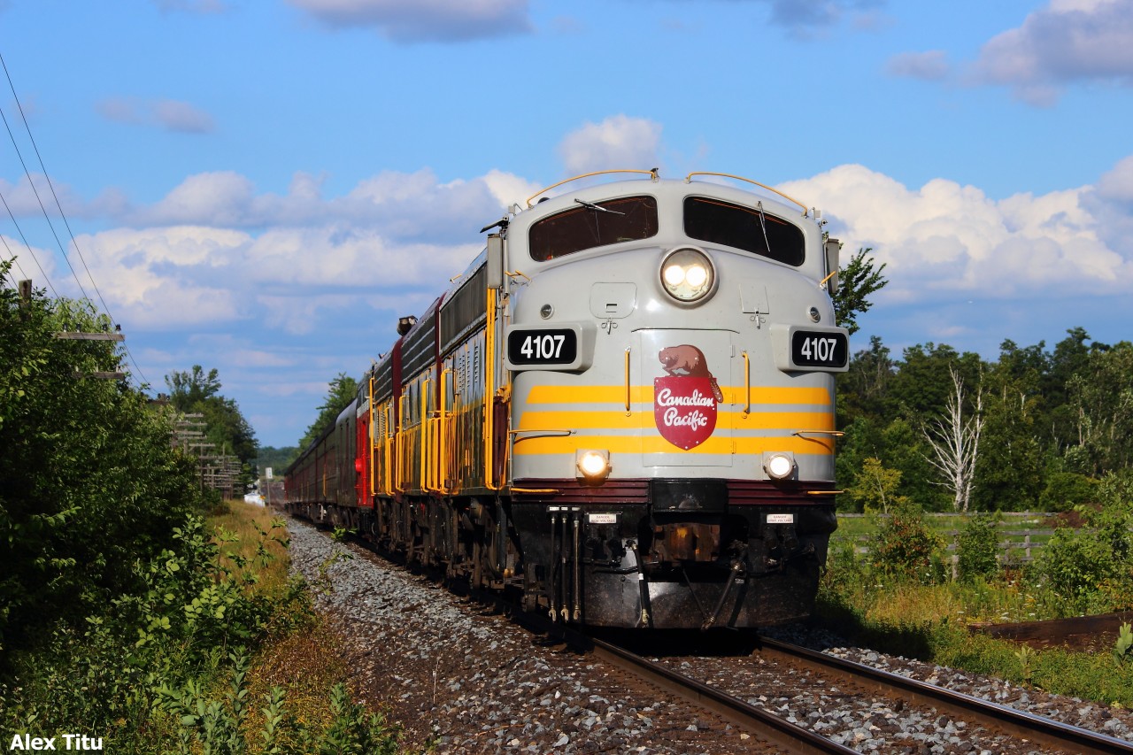 First thing I must say is thank you to all the people posting updates about the status of this train throughout the past few days. It was a big help for sure.

Today, Max, Curtis, and I chose to head over to Milburough Line to catch CP 40B en-route to London, ON. We decided to not take any risks, heading over there hours in advance. Not long after the ordered time out of Toronto, updates start to flow in from the various railfans scattered across the west side of the GTA. 

At around 17:30, our train of the day appears in the distance as I ready myself for what could possibly be my only opportunity to see this train. Luckily it looks like I did a fairly good job, and I'm glad to be one of the many great railfans to bag this one.