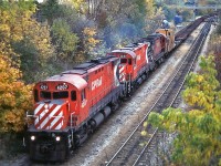 When CP took over running the Steel Train from CN, the power changed from <a href=http://www.railpictures.ca/?attachment_id=14807><b>zebra-striped F-units</b></a> and <a href=http://www.railpictures.ca/?attachment_id=15147><b>Geeps</b></a> to Action Red C424's, SW1200RS, and leased Chessie & B&O power. Here CP C424 4207 leads 4242 and another sister as they head for Nanticoke from Hamilton, running on the former TH&B just before going up the Niagara Escarpment.