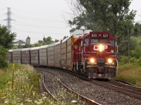 CP 8211 leads a long string of empty autoracks bound for GM in Oshawa. 