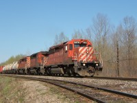 After working the interchange dropping off empty newsprint cars, the daily OVR manifest 430/431 continued to Smith Falls. 