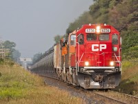 A former SOO SD60 and a pair of BNSF take charge of 640 as it hustles across Southern Ontario in perfect morning light. (CP 6236, BNSF 4515, BNSF 7275)
