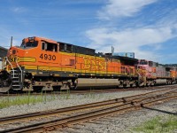 Some BNSF Dash 9's leading a mixed freight train out of Braid Junction in New Westminster, British Columbia.