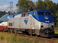 Amtrak P42DC 75 leading an Amtrak Cascades train out of Vancouver, with Amtrak Cascades NCPU 90253 as the trailing unit.