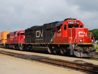 CN 382 passes the station in Brantford with a pair of SD60s, both of which are wearing the second paint scheme of their careers. CN 5402 began life as an Oakway lease engine on BN, and CP 6240 was formerly SOO 6040. Thanks to Jazzy Joe for the heads up.

 