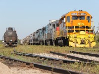 GEXR 431 is resting in the Kitchener yard again; the crew left it again. The 431 was switching around before this scene, causing a traffic nightmare on the roads crossing the tracks and Victoria Street, which runs parallel to the tracks. Power is GEXR 3393-GEXR 3054-GSCX 736x.