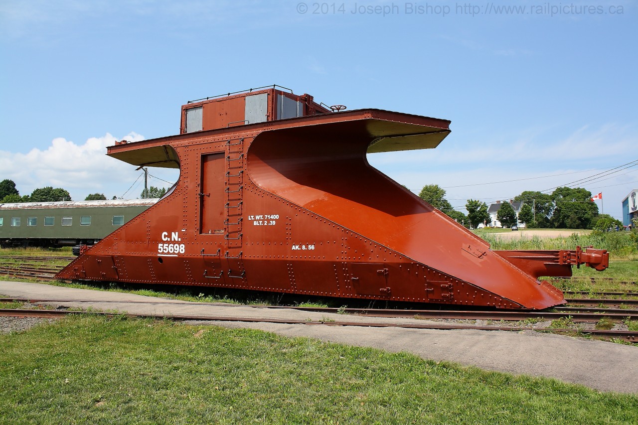 The New Brunswick Railway Museum is home to many unique pieces of rolling stock and locomotives that once operated on the now abandoned lines across the province.  One of their more unique pieces in their collection is  CN 55698 a double ended snow plow.  Being double ended allow crews to just run the locomotive around the plow rather than having to wye the whole train.  It saw many years of service in hard East Coast Winters before being retired and ending up on display at the museum.