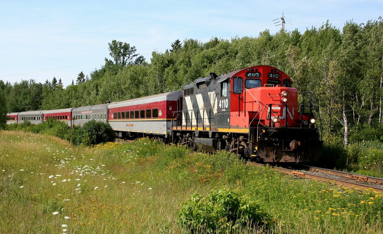 The southbound Agawa Canyon Tour Train crosses Second Line as it returns to Sault Ste. Marie at the end of another run. The train is now within the yard limits and will soon be passing the sprawling Steelton yards of the former Algoma Central Railway and the Algoma Steel Company before arriving at the downtown station.