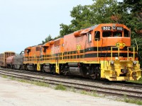 Huron Central RM-1 road slug 802, GP40-3 3802 and GP40-2(W) 3010 work the yard at Sault Ste. Marie building the train that will depart later in the afternoon for Sudbury.