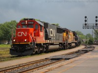 When I left the office at 12, it was pouring rain.  By the time I got to the station the rain had let up and about ten minutes later the sun was out and about ten minutes after that 331 showed up with CN 5442 and CN 2026 providing the power.