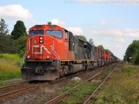 CN 435 throttles up at Hardy Road with a great consist of CN 5764, IC 1029, CN 5645, CN 1412, CN 4770, CN 4729.