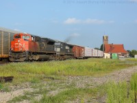 CN 360 gets back up to speed through Brantford after being held at Massey's for a meet with CN 330 before being allowed to go around CN 435 who was working off the North Track in Brantford.  Via 83 was held at Massey's to allow 360 to clear and CN 332 was held at Hardy Road to allow 360, 83 and 435 to all clear.  It made for quite the show after work!