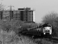 Rocketing up the 1% grade, this L10L set in charge of the last train to Barrie tries to take advantage of the 75mph speed limit as it rounds the curve at Fairbanks on approach to Castlefield Avenue in Toronto's less fortunate parts. As much I liked the location, and the backdrop for northbound trains it offered, I won't be returning here anytime soon, as getting screamed at by a bunch of hoodlums in their car is not something I would like to experience again.