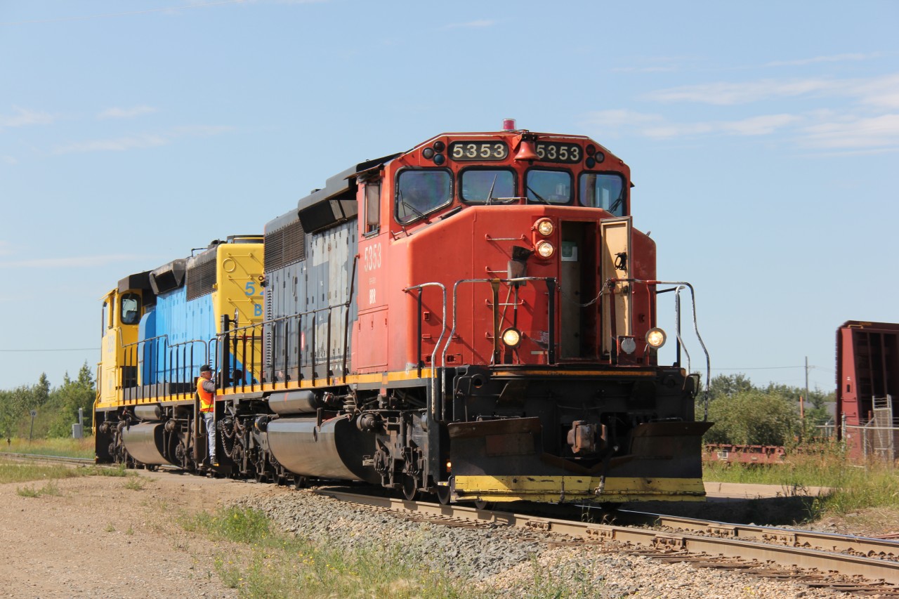 Battle river railway 5253 and sister 5251 head over to CN's north yard in Camrose to lift grain empties for spotting on the Alliance subdivision.