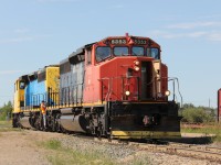 Battle river railway 5253 and sister 5251 head over to CN's north yard in Camrose to lift grain empties for spotting on the Alliance subdivision.