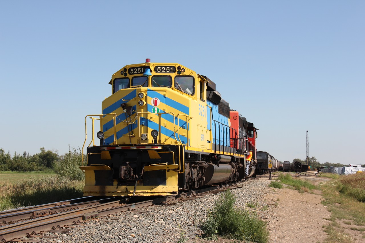 Battle river railway 5251 and sister 5253 head over to CN's north yard in Camrose to lift grain empties for spotting on the Alliance subdivision.