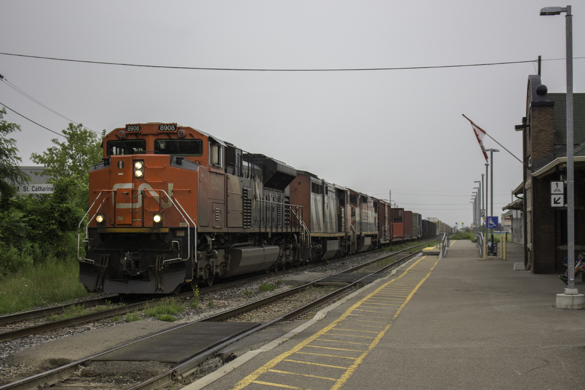 Although a daytime appearance of CN 421 is now rare in St. Catharines, this is the second day in a row its done so. CN 8902 leads a pair of GE cowls past St. Catharines just before rain set in.