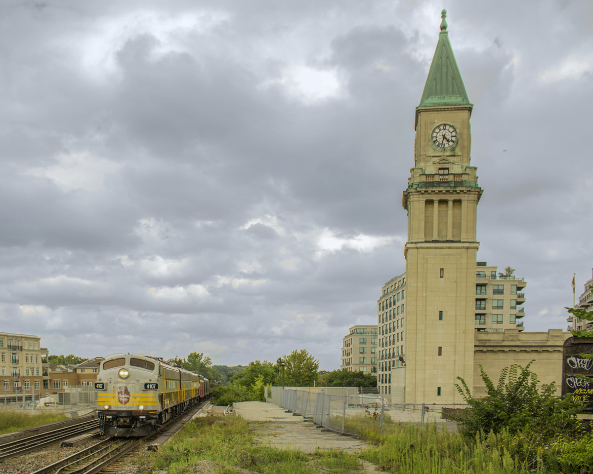 I hate to say it, but I have not had the best of luck when seeing the Royal Canadian Pacific business train in both instances. Each time, my camera and lighting did not cooperate, and if clouds were human, I would surely have a heated discussion with them after this shot, especially because I cut weeds for three hours to get it. However, at least I saw this train, as not everyone could. Having waited since 3pm, and constantly monitoring the train to see if it departed Agincourt, eventually it was lined up. Around 4:35pm, I heard the distinctive old cast horn of an F unit at Rosedale, probably the crew greeting railfans. About a minute later, CP 40B-17 roared past on its way to London. Many CP execs were in the last car looking out the rear window, staring me down as the train rolled away. At this point, I'm sure they had seen many railfans along their trip, and there will be more down the line, and probably when they head back to Calgary too.