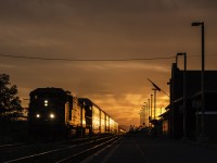 CN 330 makes another rather late appearance through St. Catharines. Having shown up 8 minutes later than the last time I saw it, the sun was a little further down. Both locomotives are of 5500 series, however of different railroads. With CN 5550 leading, BNSF 5523 trails elephant style with the sun radiating very strongly off the autoracks. With the tank cars in the distance also lit up, the end of the train is noticeable. 