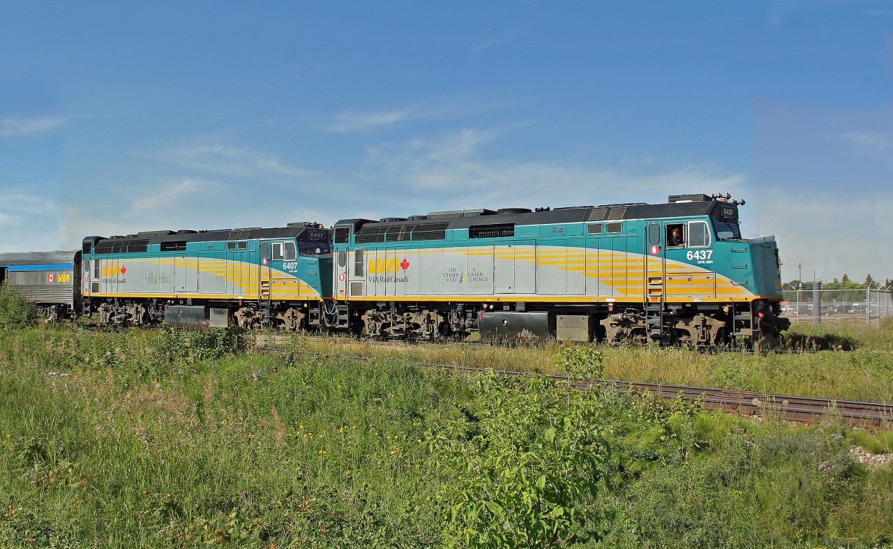 Running just about 4 hours late, scheduled 6:30 a.m. arrival this pic at 10:35 a.m., F40PH-3's 6437 and 6407 push back into the VIA station in Edmonton with train #1 "The Canadian".