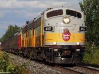 Just 2 days ago I got a shot of this rarity coming down the MacTier subdivision, now I get her again with a few friends just west of Guelph junction at the first horn zone crossing west of Toronto along the Galt subdivision. CP 4107, CP 1900, and CP 4106 lead a special Royal Canadian Pacific train, en-route from Calgary, AB to London, ON for the womens open golf tournament. CEO Hunter Harrison and a few others were all on board this special run. It should be coming back to Calgary either the same way or through the USA in about a week.