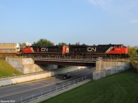 Wanting a shot like this for most of the summer, I finally got it. CN 1** West with 2 SD70M-2's heads to B.I.T in perfect lighting.