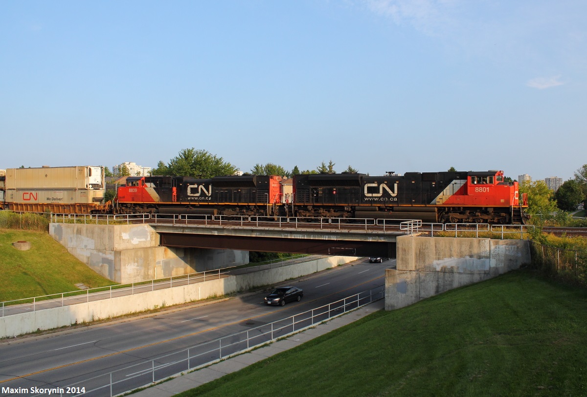 Wanting a shot like this for most of the summer, I finally got it. CN 1** West with 2 SD70M-2's heads to B.I.T in perfect lighting.