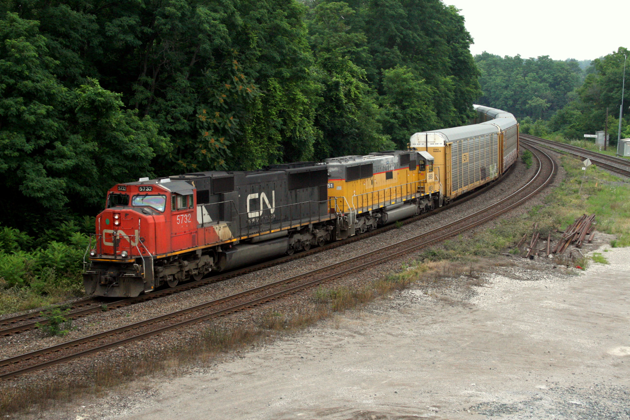 CN 393 takes a run at the Copetown Hill with CN 5732 and NREX 5951 providing the power.
