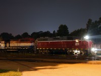 "End of an era ?" Usually powered by 2-3 CEFX GP20D's and a GP40 we see NECR 3840 - RLK 4057 provide the power for 597 as they pause from building the nightly train to Garnet