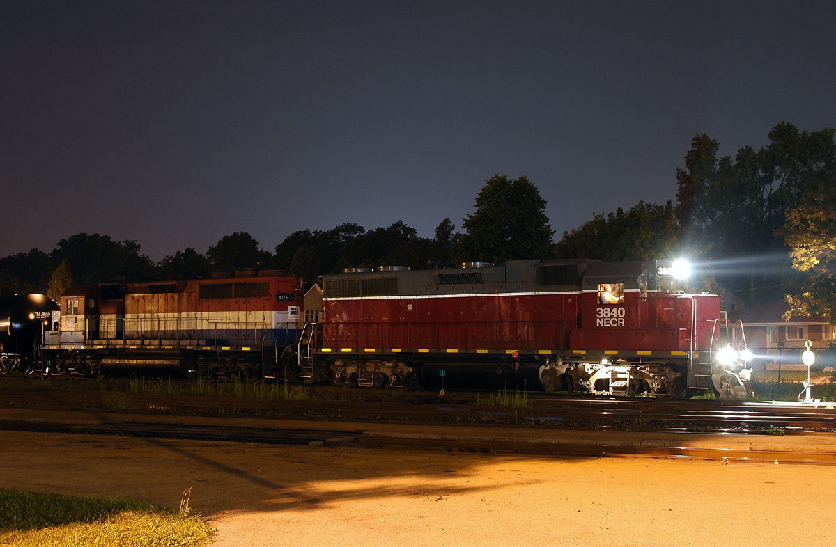 "End of an era ?" Usually powered by 2-3 CEFX GP20D's and a GP40 we see NECR 3840 - RLK 4057 provide the power for 597 as they pause from building the nightly train to Garnet