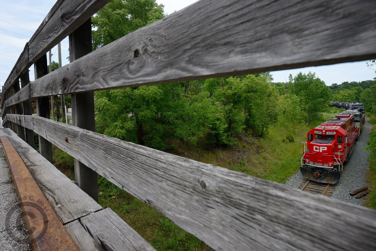 Back at Snake Rd bridge (Built in 1910 when line was constructed) - and after a 4 year hiatus - I come armed with a wide angle lens, what would I try differently? Well, this is what I came up with, given the lighting conditions. With this bridge now all but condemned (pedestrian traffic only) I figure next time I get here it'll be something new. (For what I did 4 years prior, see this photo in Fall 2010 - armed with my trusty 50mm f/1.8