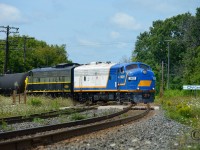 What a treat - a pair of covered wagons hauling freight trains in North America again. In this scene at Woodstock, the pair of FPA's cross the CN Dundas Subdivsion at Carew Diamond to yard their train of about 25 cars and go for lunch. Trailing 1401 is OSRX 6508,ex WSJR 6508 (Tourist train at Waterloo 1997-2000) ex CN 6508