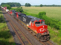 CN Q148 with CN 2661 & CN 2663 leads long long intermodel train just outside of London, Ontario