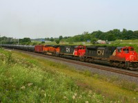 After being held at Snake to allow VIA 80 to sccot by, CN 8880, IC 1008 and BNSF 6977 get 710 rolling again.
