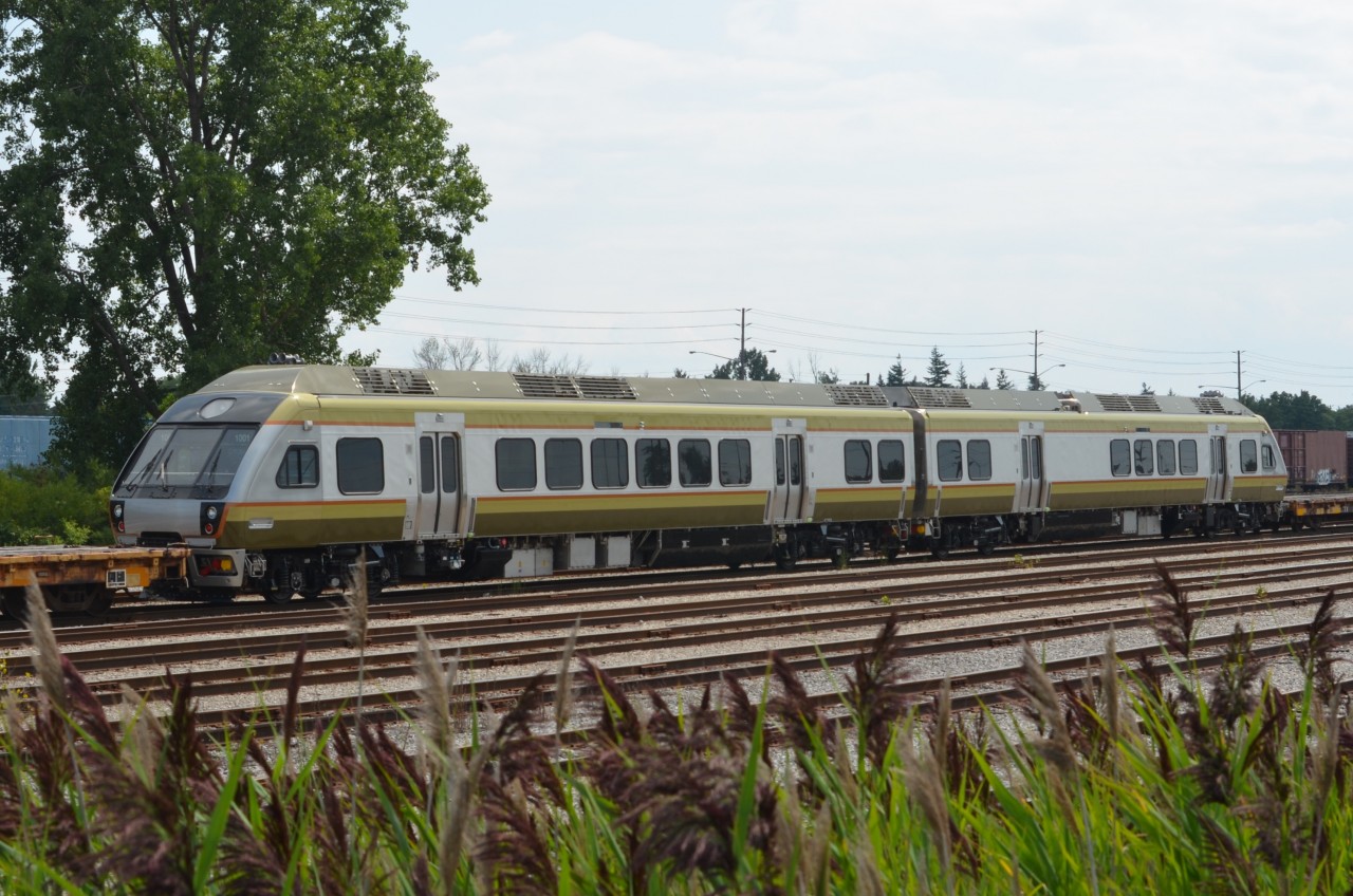 The first two DMUs (1001, 1002) to be used on Metrolinx's Union Pearson Express, opening in 2015, lay in the warm August sun in CN's Oakville Yard.
