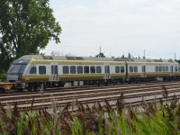 The first two DMUs (1001, 1002) to be used on Metrolinx's Union Pearson Express, opening in 2015, lay in the warm August sun in CN's Oakville Yard. 