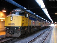 VIA trains using Track 1 isn't a frequent occurrence as it's usually GO-only - VIA uses the higher numbered platforms at the south end of the train shed. Today however that's not a Georgetown GO train, but VIA #93 for Niagara Falls loading on Track 1 under the train shed at Toronto Union Station. F40PH-2D 6418 leads the two stainless steel Budd "HEP" cars, awaiting departure in just over an hour at 11:00am. <br><br> Fast forward a few years, and the majority of the Niagara Falls VIA trains were cancelled in 2012 when GO started running their own trains to the 'falls.
