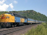 VIA train 83 climbs the Dundas escarpment at Dundas, 30 years ago in August 1984. MLW-built FPA4 6767 leads a nearly perfect consist (with an ex-CP Budd car mingling among the matching ex-CN blue and yellow equipment).